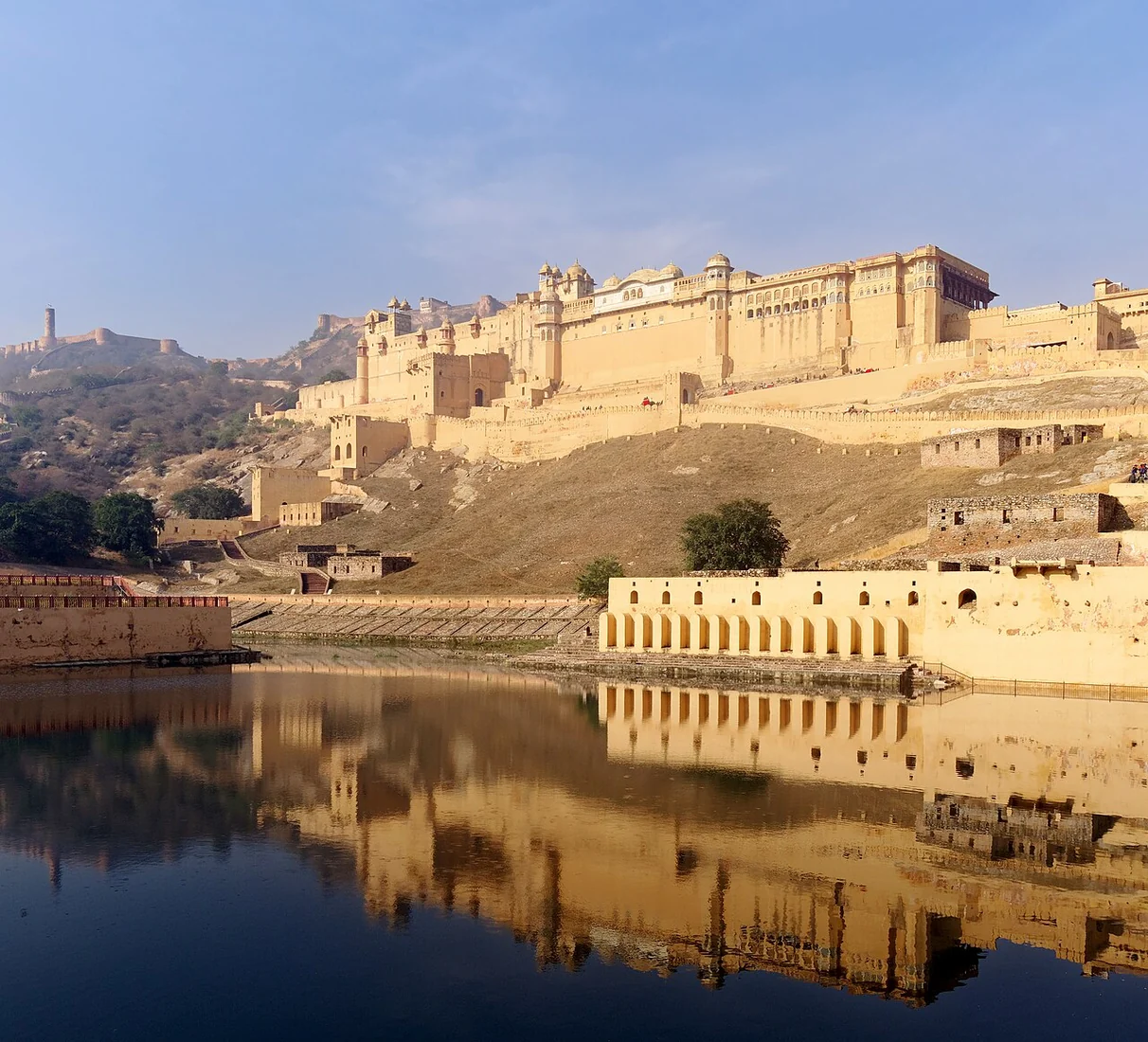 Amber Fort, which contains Sheesh Mahal, beside Maotha Lake